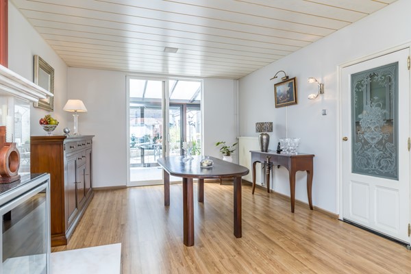 Foto - Verkocht onder voorbehoud: Nette twee- onder- een – kapwoning met serre, zonnige tuin en garage in Bocholtz